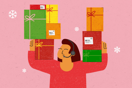 Woman wearing headset holding parcels