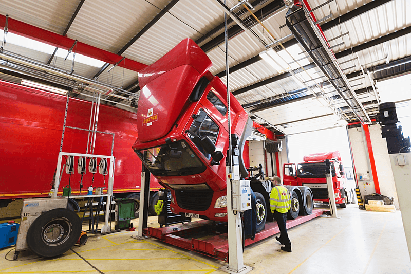 Truck being inspected in a vehicle workshop