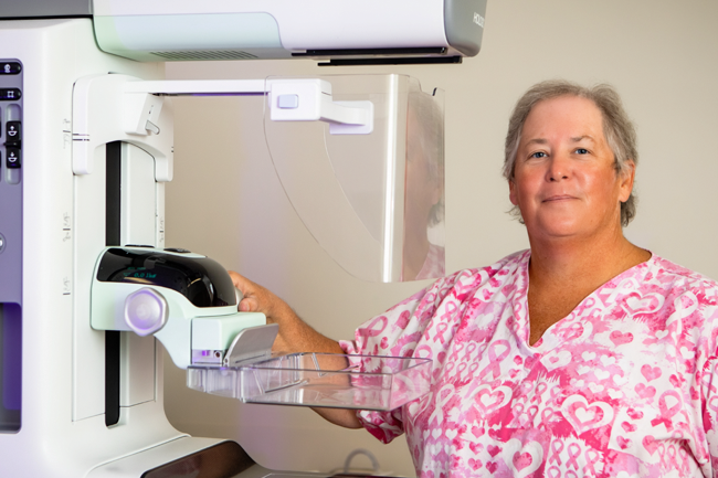 Smiling healthcare professional with imaging technology