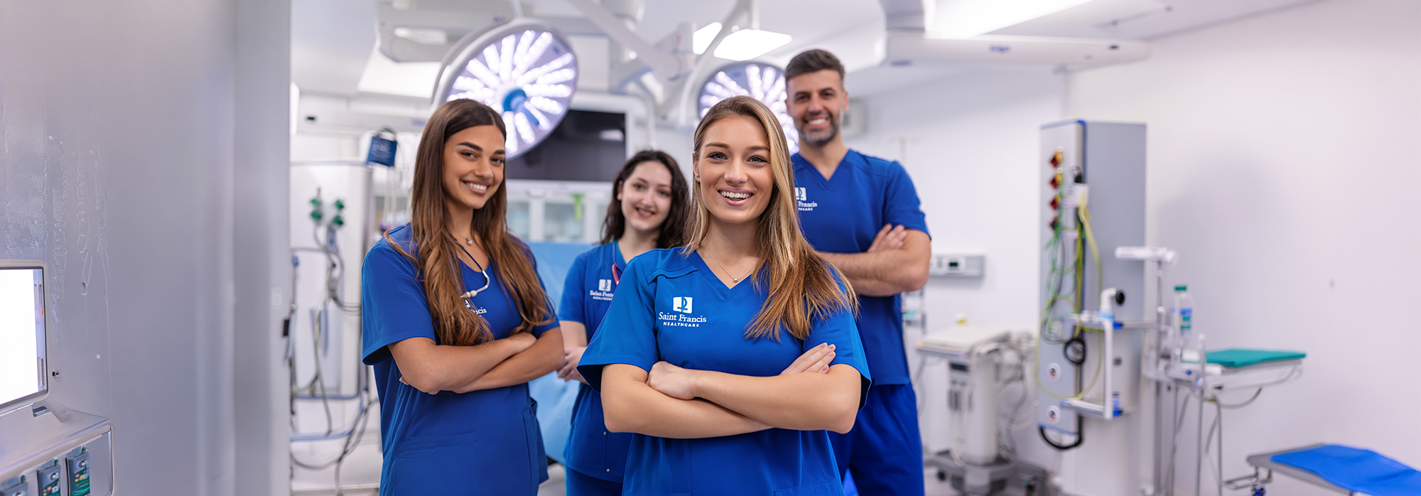 Nurses stand in an operating room
