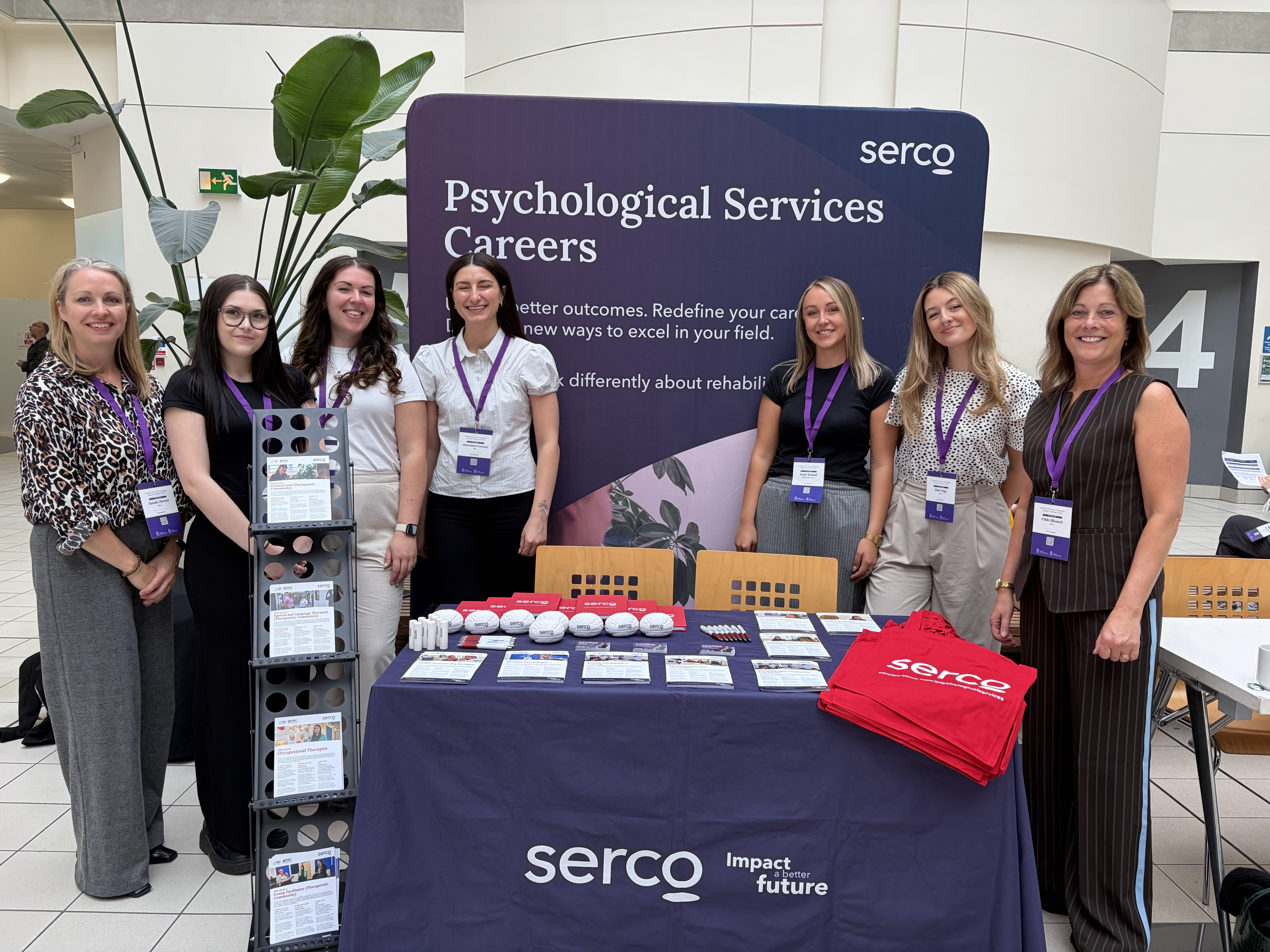 Colleagues standing at the Serco stand at the DFP Annual Psychology Conference 2026