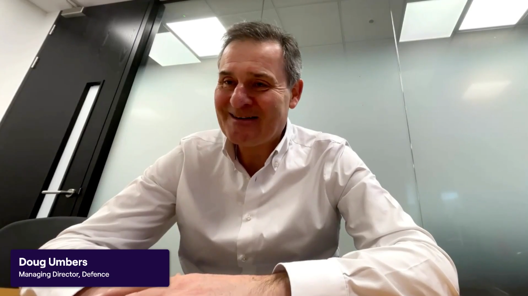 Doug Umbers - New Graduate Programmes 2026 - COVER IMAGE of a man in a white shirt in an office