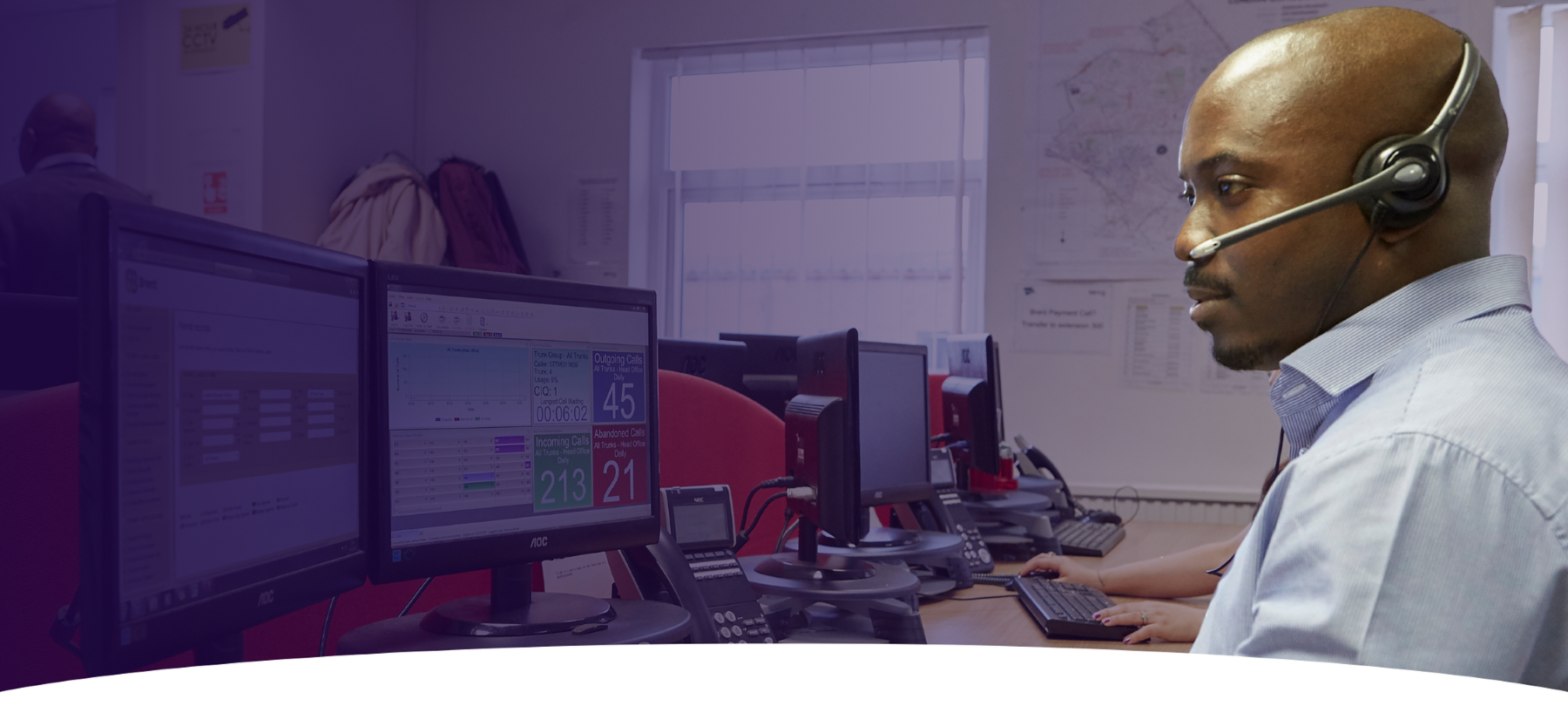 Hero-Man-at-Desk-Headset-Computer-Career-Pathways