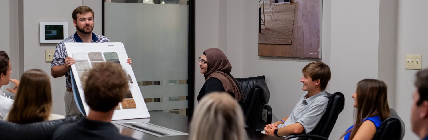 A class full of shaw associates receive leadership and development training.
