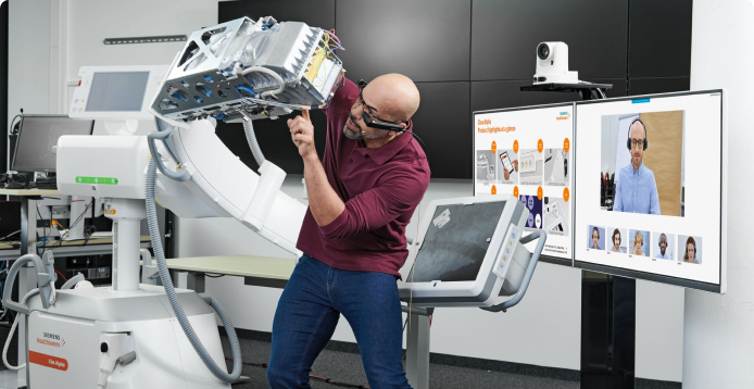 Healthineer working on a Siemens Healthineers product