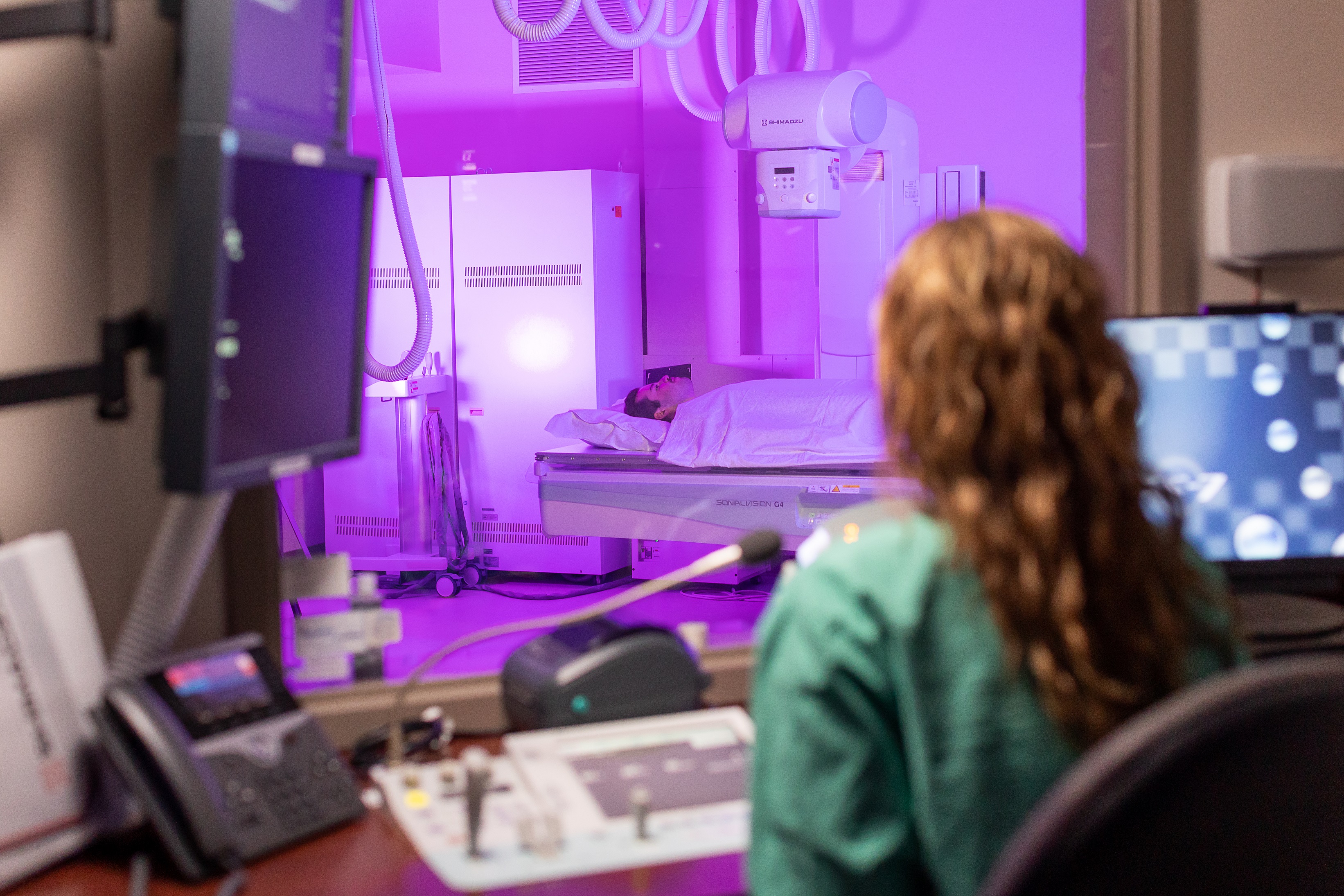 Radiology Rad Tech in Control Booth