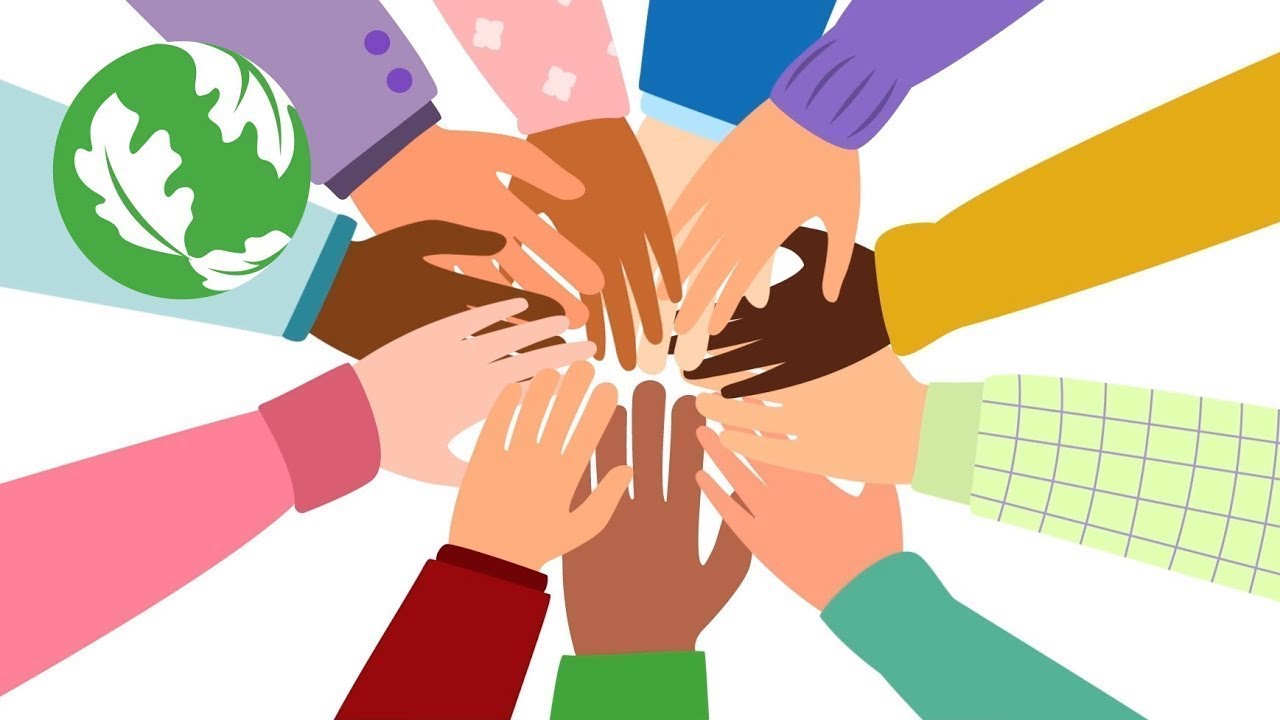 A group of hands putting together