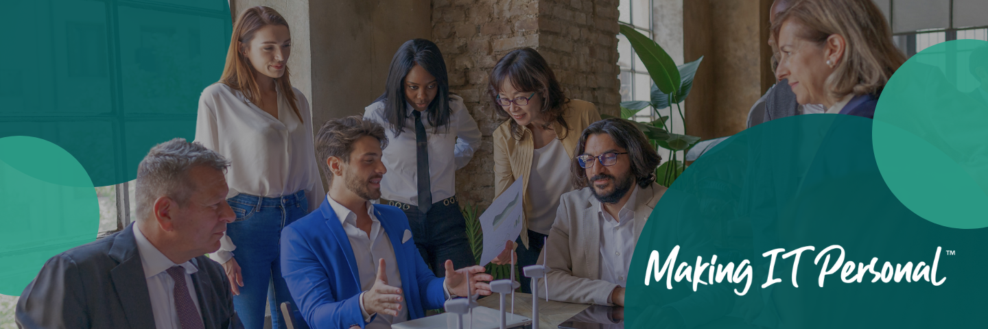 Coworkers sitting and standing around a table with a border of green bubbles