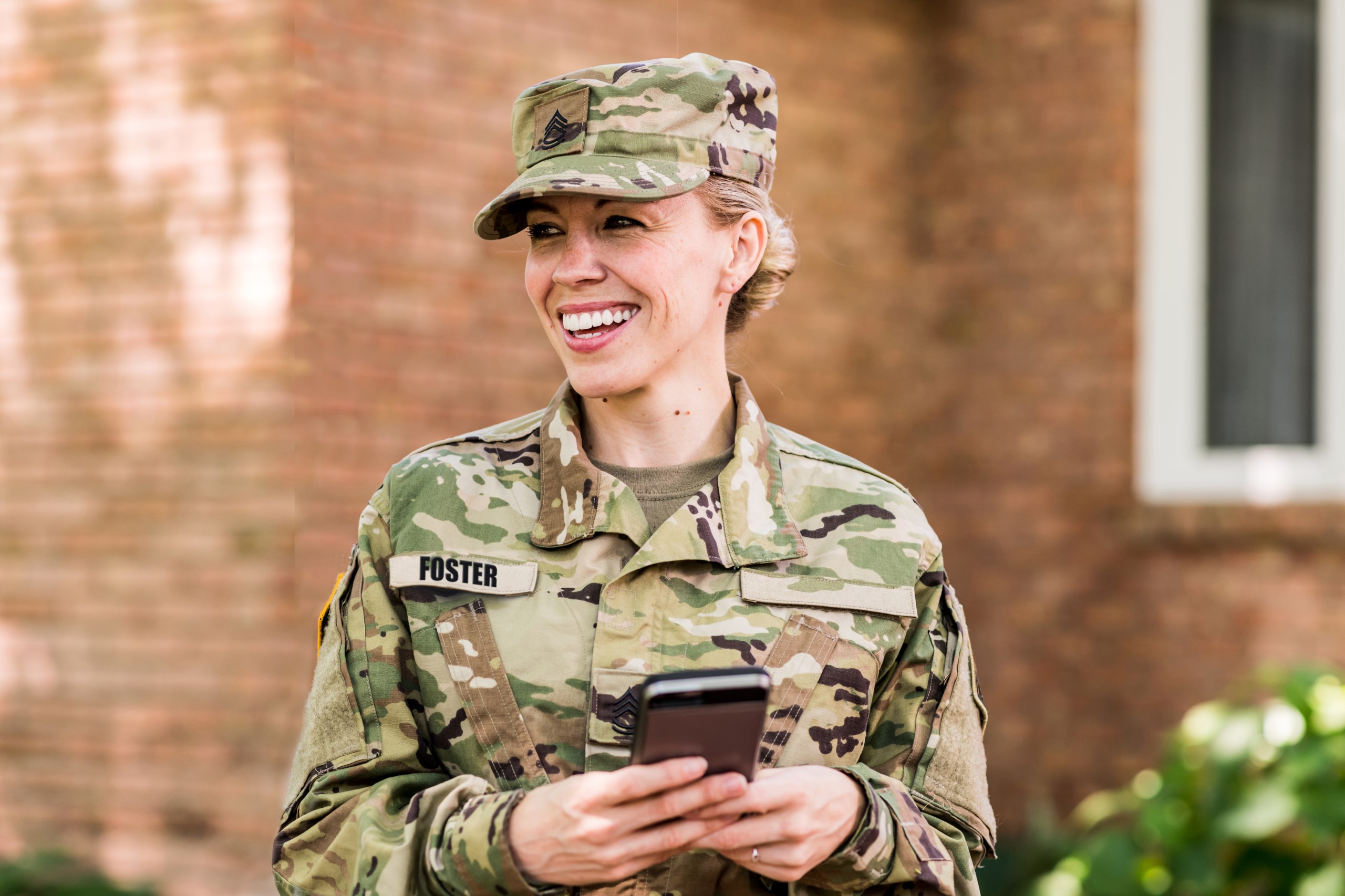 Front facing, smiling person