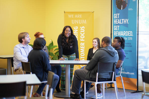 people meeting and laughing