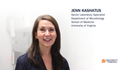 Person looking at camera with white background. Name and job title in type on upper right corner.