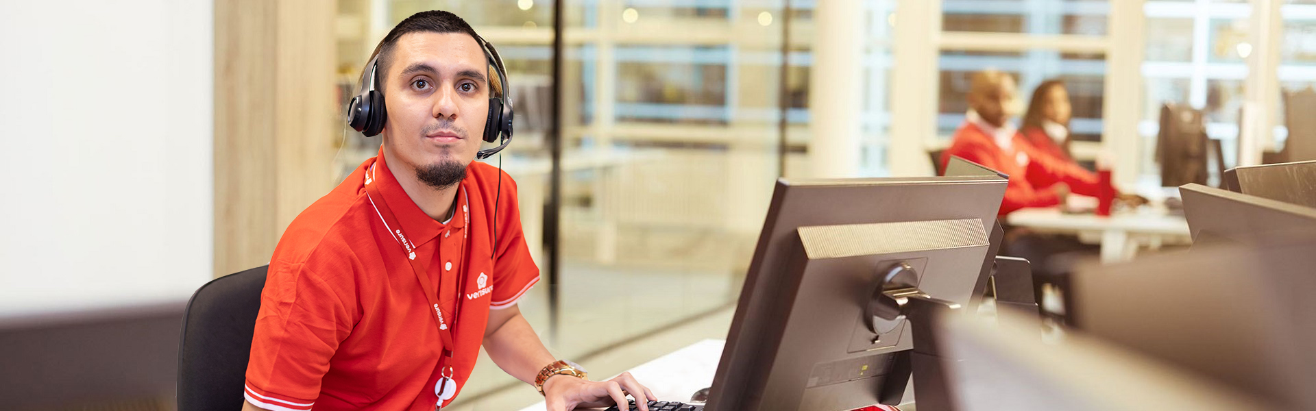 Verisure employees in meeting with presentation