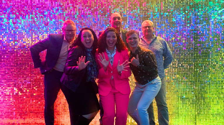 Team posing at Rainbow Excellence Awards