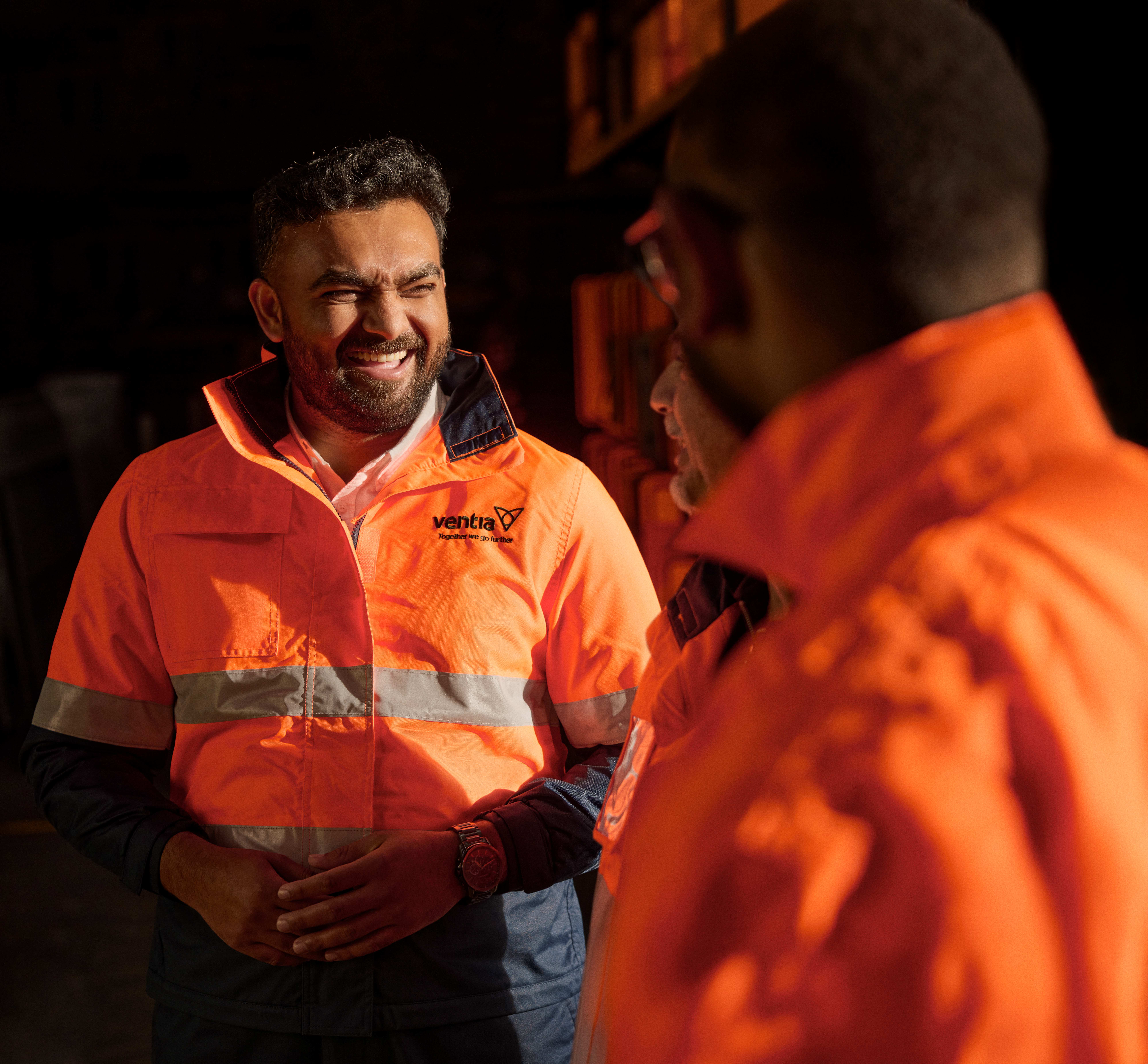 man smile orange hivis