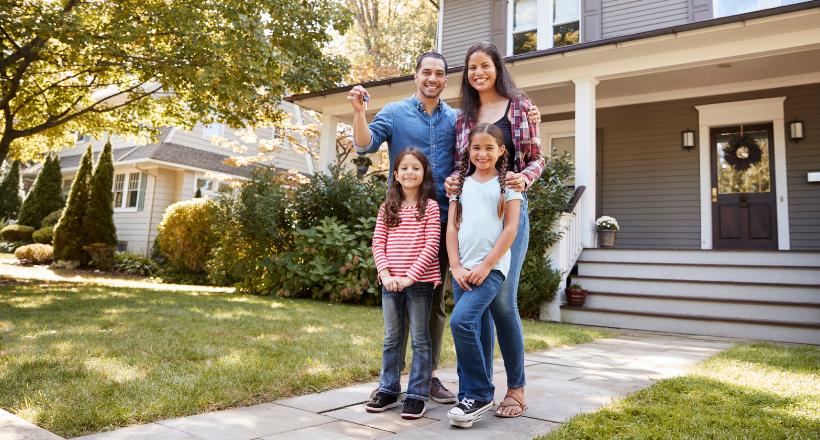 A family of four moves into their new home.