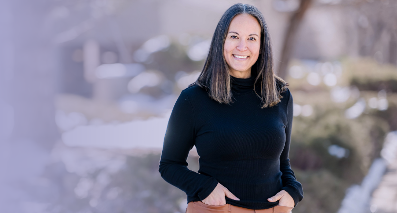 Jessica Missun, a business development manager at BAE Systems, stands for a photo outside a company facility in Boulder, CO.