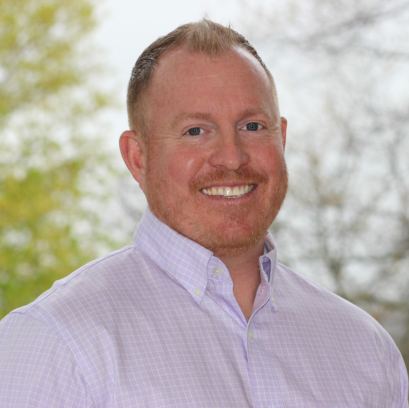 Darren, part of our military hiring team, poses for a headshot.