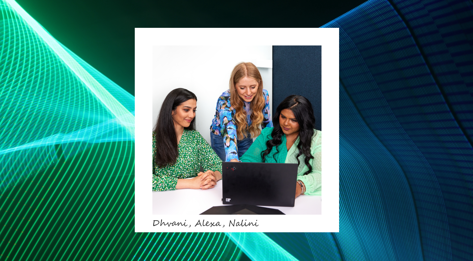 Three individuals sitting at a table with a laptop. Two of the individuals, and the third individual, with long hair, is standing behind them helpinf them with something on their laptop. They appear to be engaged in collaborative work or discussion involving the laptop. The background consists of geometric shapes in shades of blue and green, creating an abstract design