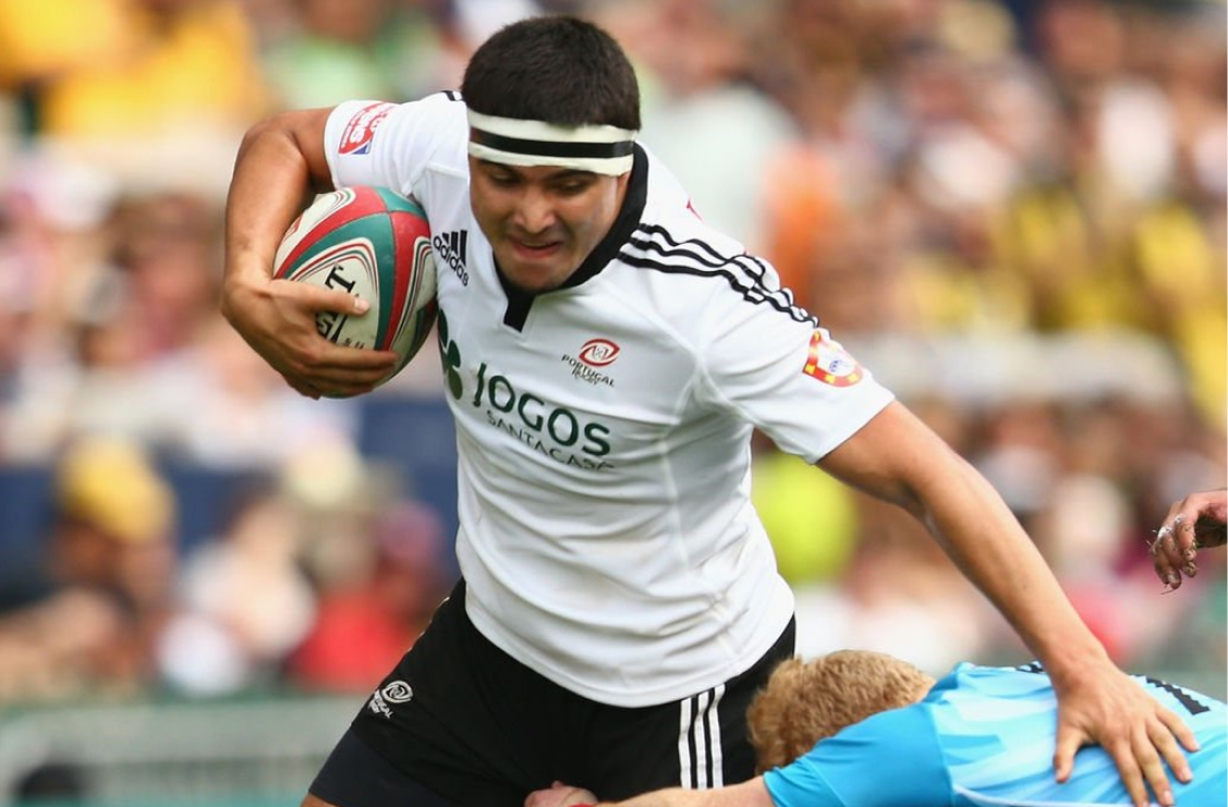 Miguel playing rugby