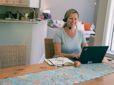 Employee working from home at their kitchen
