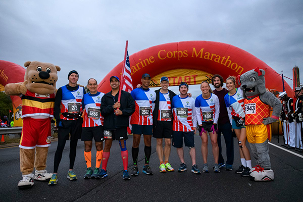 Cigna Group employees at the start of Marine Corps Marathon