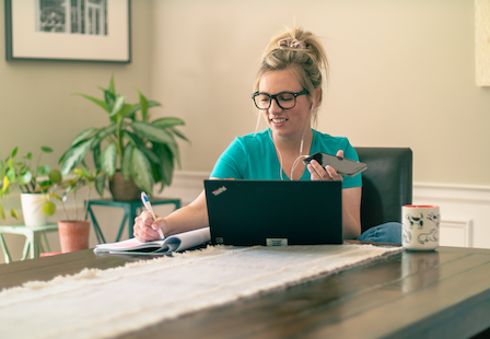 Employee working from home and answering their phone