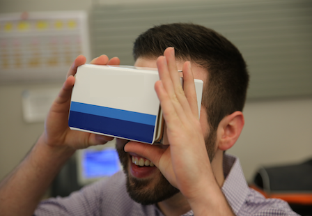 Employee looking through a view finder