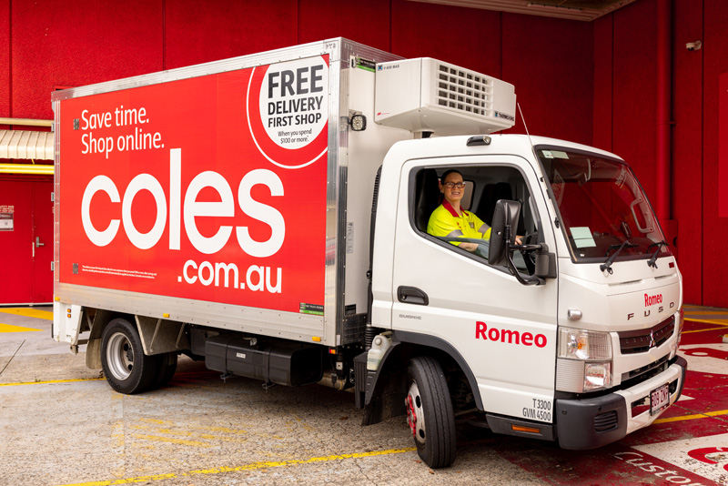 Coles delivery van driven by a female employee
