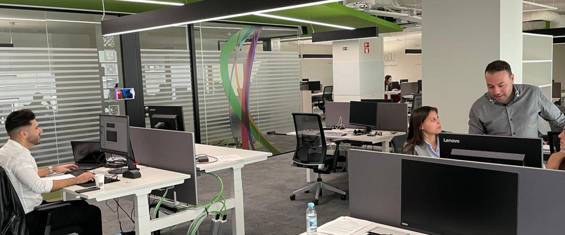 our lisbon employees working in the office