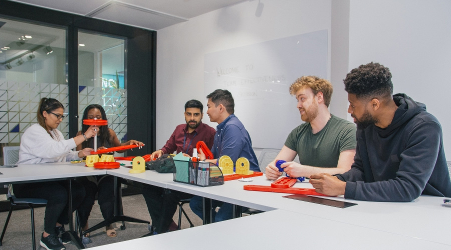 group of people working through a problem solving activity