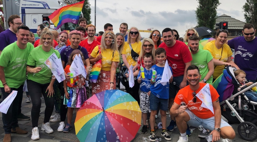 group of people celebrating at a pride parade