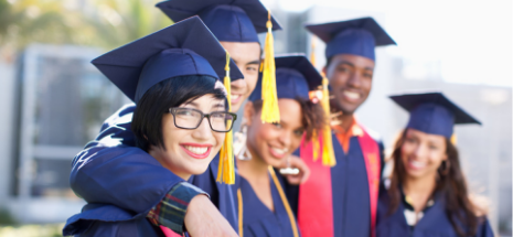 Photo of college graduates in their caps and gowns 