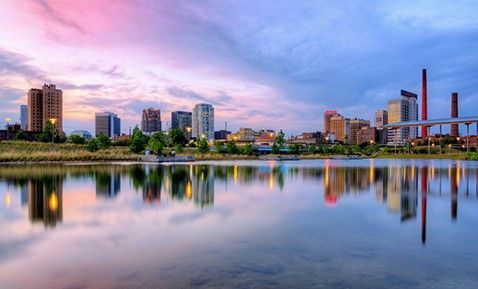 A picture looking over the water to the skyline of Birmingham.