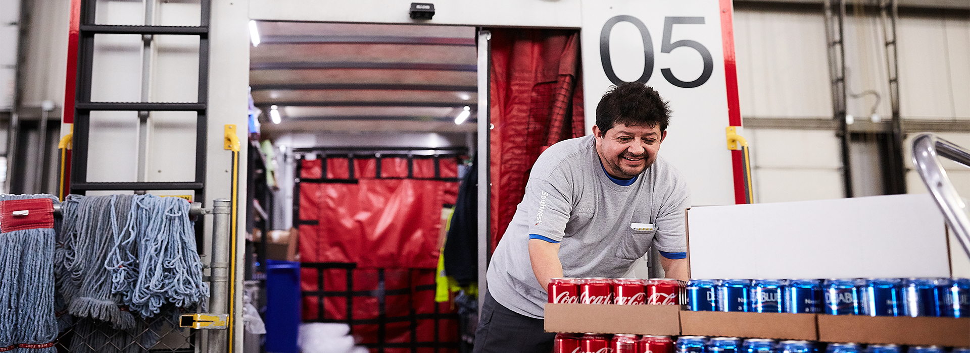 Provo Agent pushing soda cart