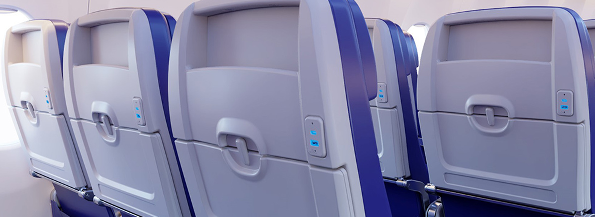 Power plugs in the back of the airplane seats