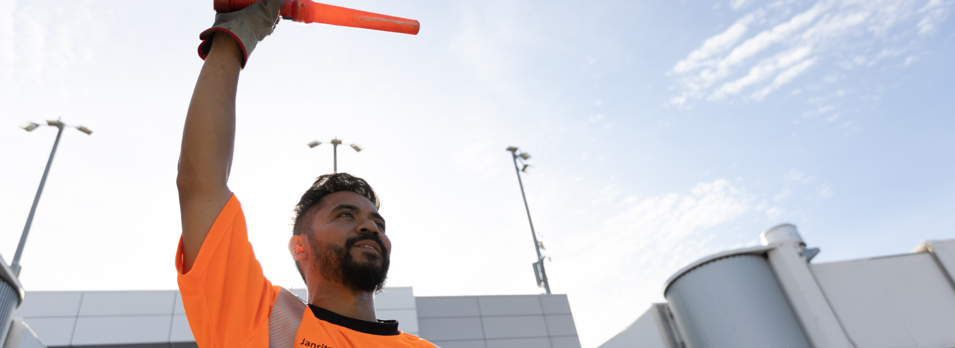 Southwest Ramp Agent marshalling in a plane 
