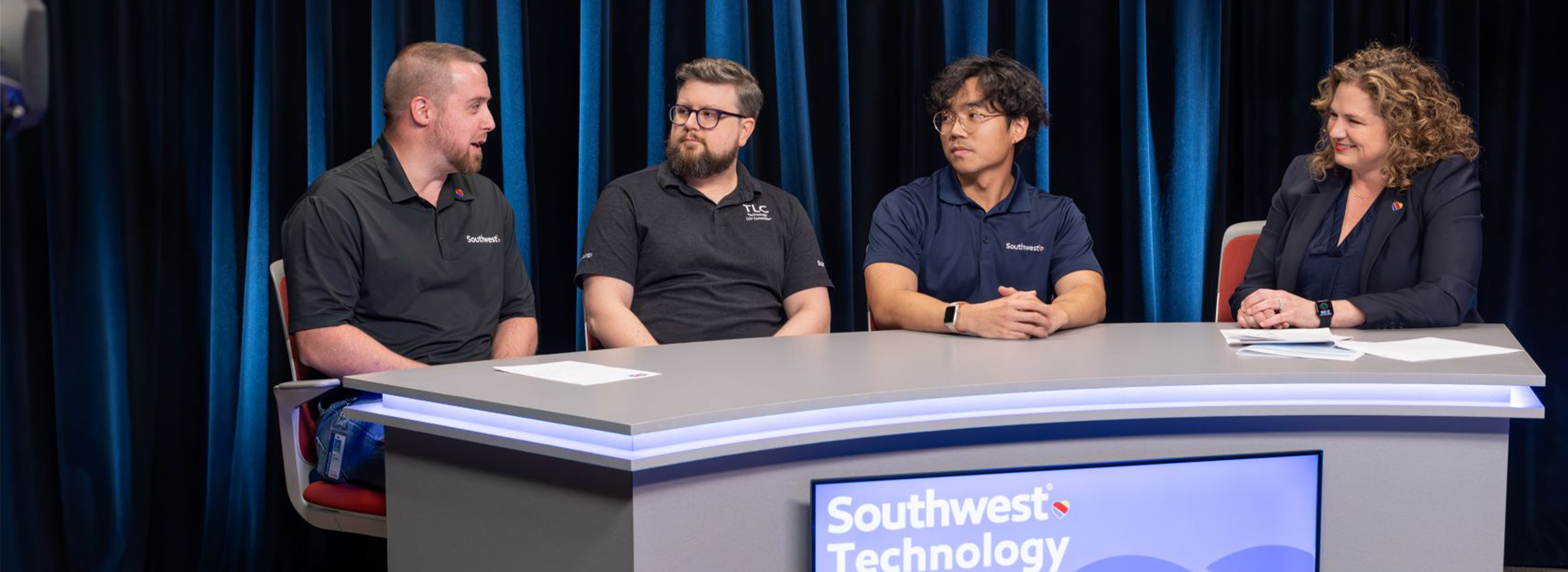 Four Southwest Employees talking on a panel to each other