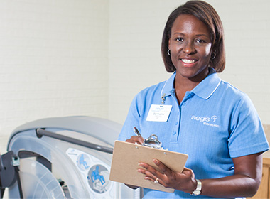 A nurse holding a clipboard