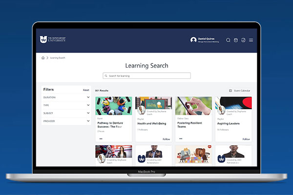 Open laptop with the TAG U website displayed on the screen