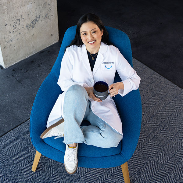 Instructor with a cup of coffee relaxing in a chair