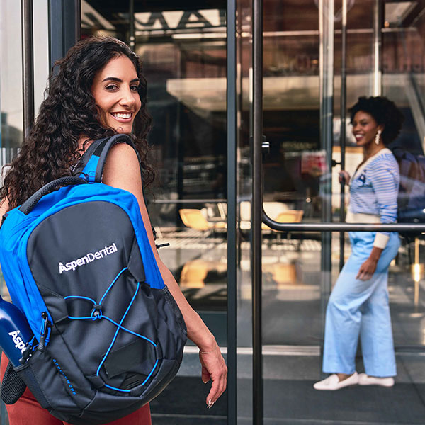 A young woman entering TAG U