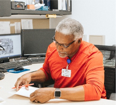Image of man doing paperwork 