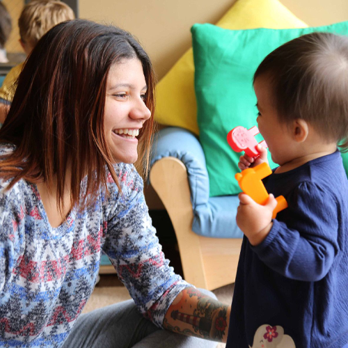 Young teacher and toddler