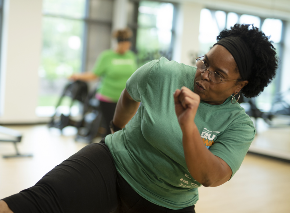 Children’s employee participates in on-site fitness class.