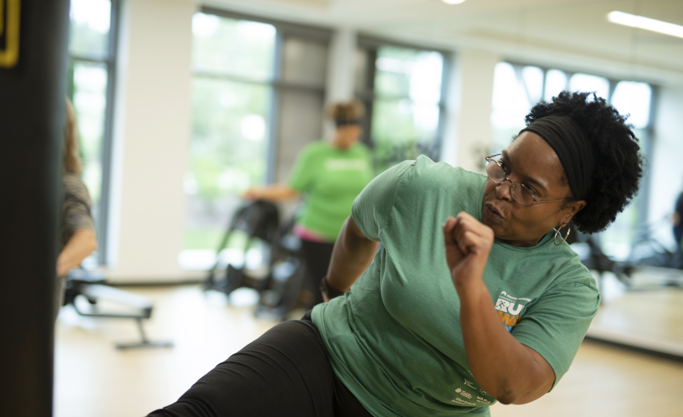 Children’s employee participates in on-site fitness class.