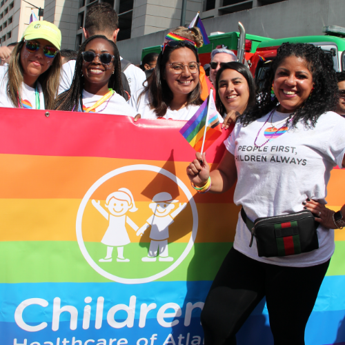 therapy dogs running down hall of hospital