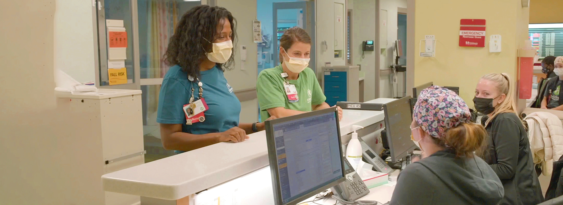 Nurse checking child's heart beat
