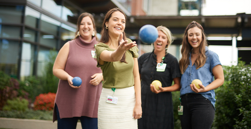 employees throwing bocce ball