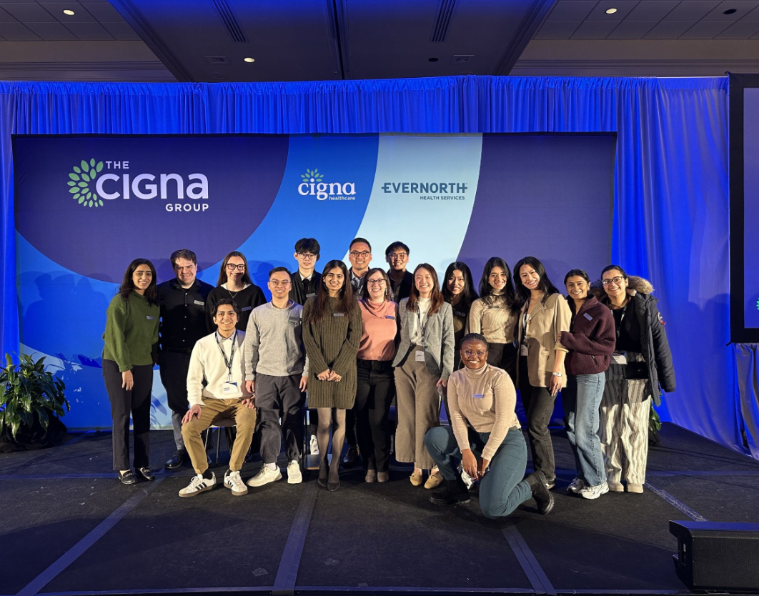 AEDP associates posing for photo during a team celebration