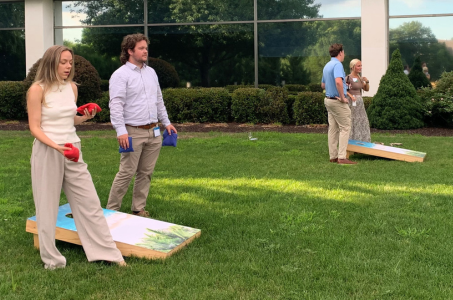 SCDP associates playing corn hole